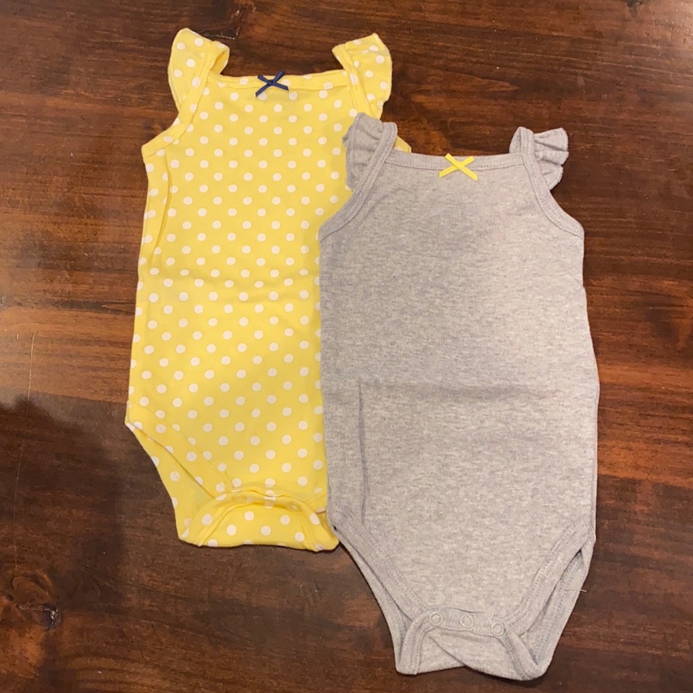 Two brand new bodysuits 0-3 months